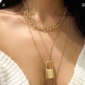 AUTHENTIC LOUIS VUITTON Lock Necklace